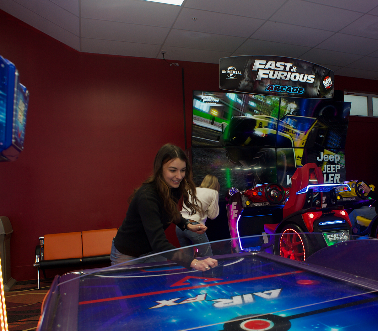 playing air hockey