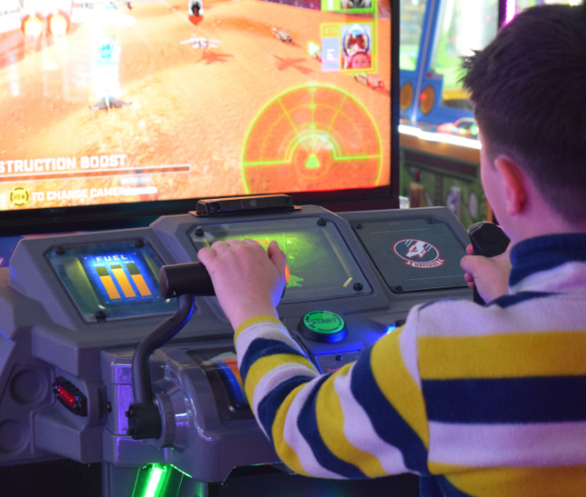 Playing virtual game hilltop fun center